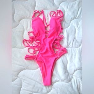 Neon hot pink strappy one piece low cut swim